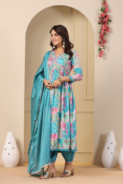 blue floral printed cape-style dress or gown with a long dupatta (scarf).